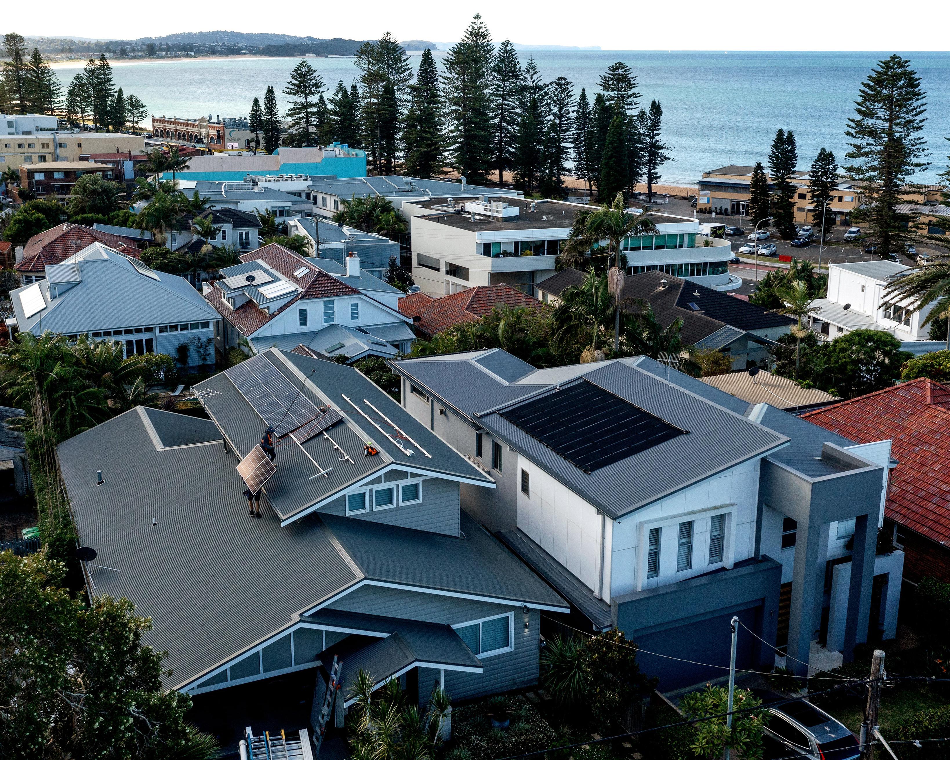 Home loan applications down by 15% since budget, CBA says – as it happened