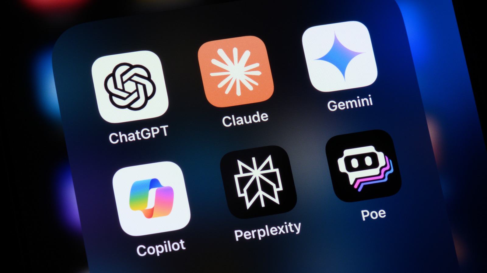 Smartphone screen displaying ChatGPT, Claude, Gemini, Copilot, Perplexity and Poe app icons