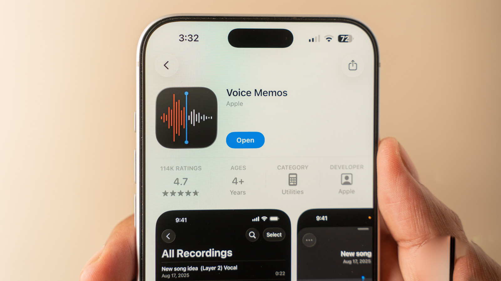 An iPhone displays the Voice Memos App Store page in a person's hand.