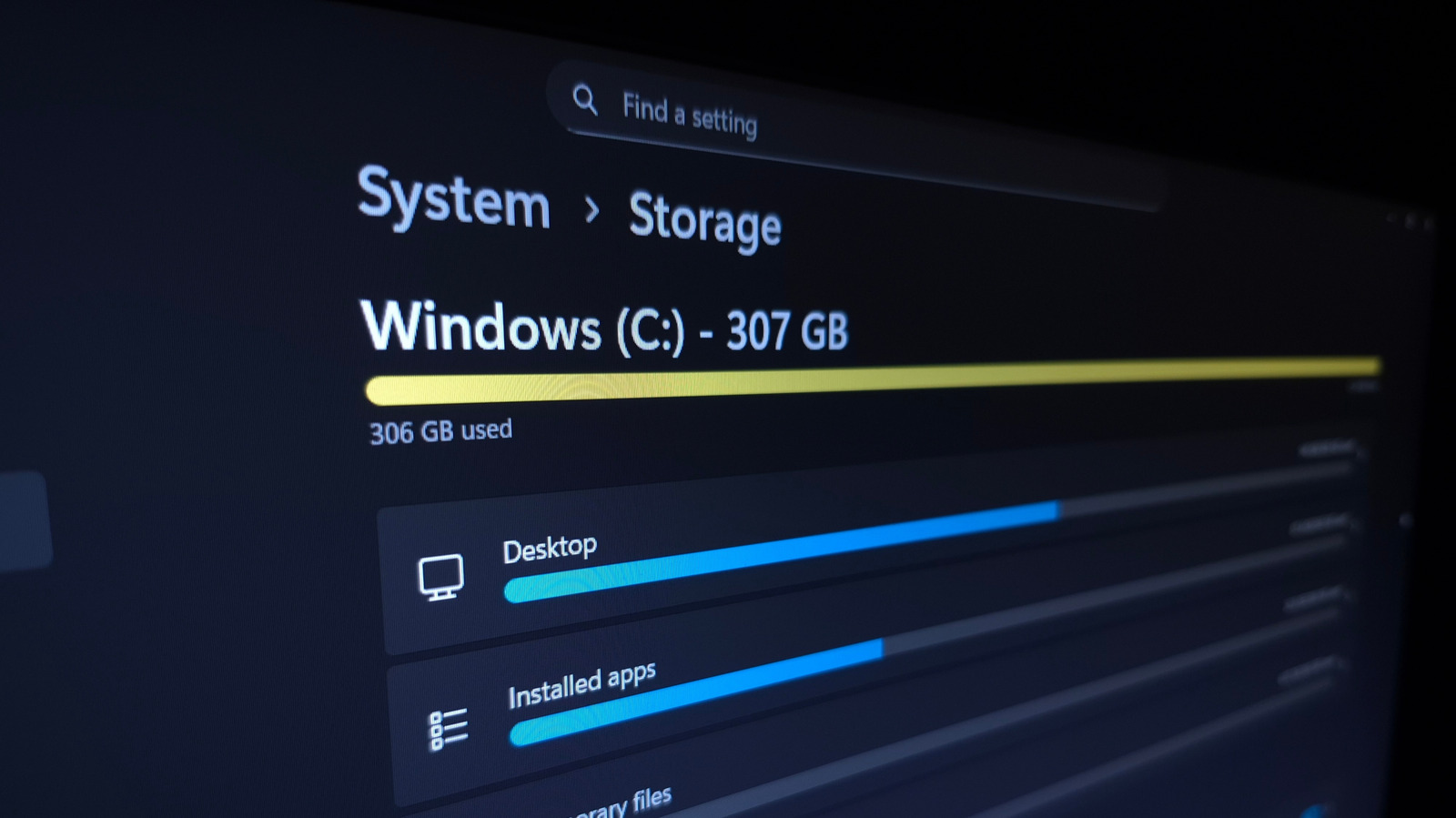 Windows System Storage settings screen showing a nearly full 307 GB C: drive