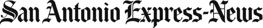 A nearly black image with faint, indistinct shapes and scattered light specks across the frame.