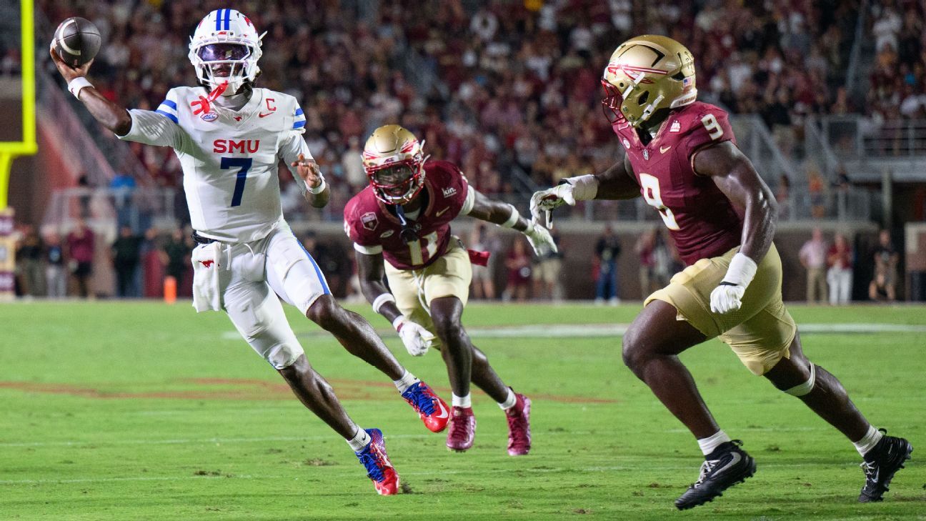 SMU quarterback throws as two Florida State defenders pursue across the football field