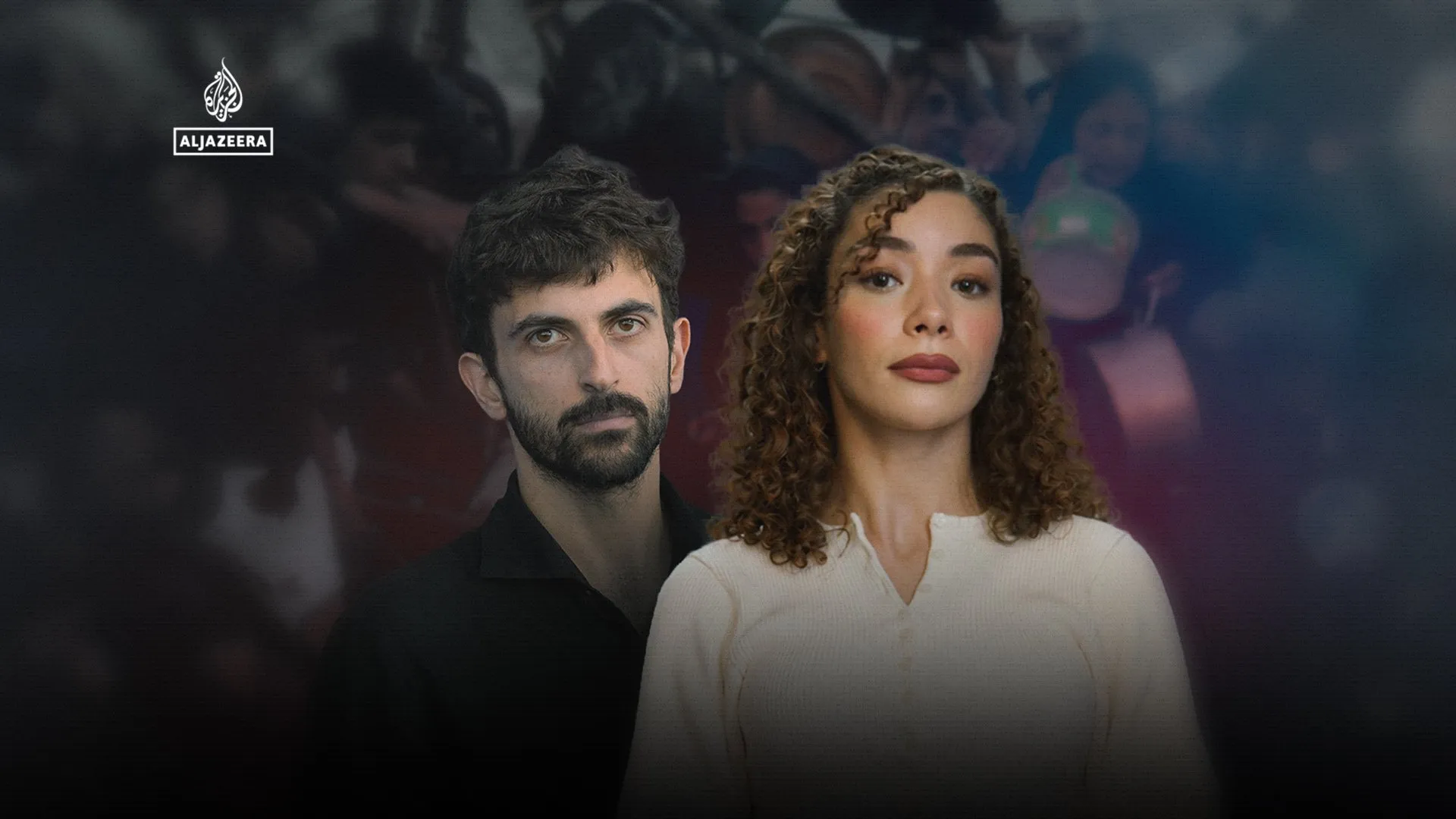 Two presenters stand before a blurred crowd, with an Al Jazeera logo in the upper left.