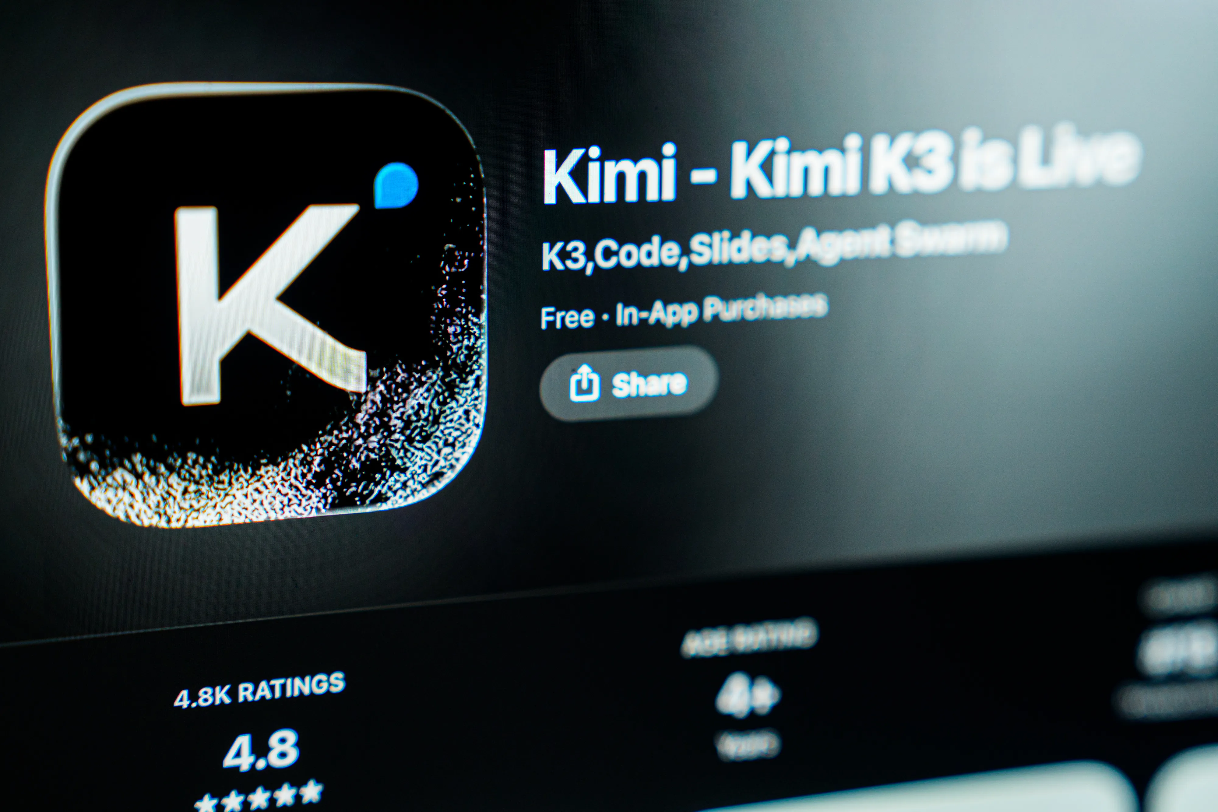 Close-up of a screen displaying the Kimi AI app listing with its logo, rating, and share button.