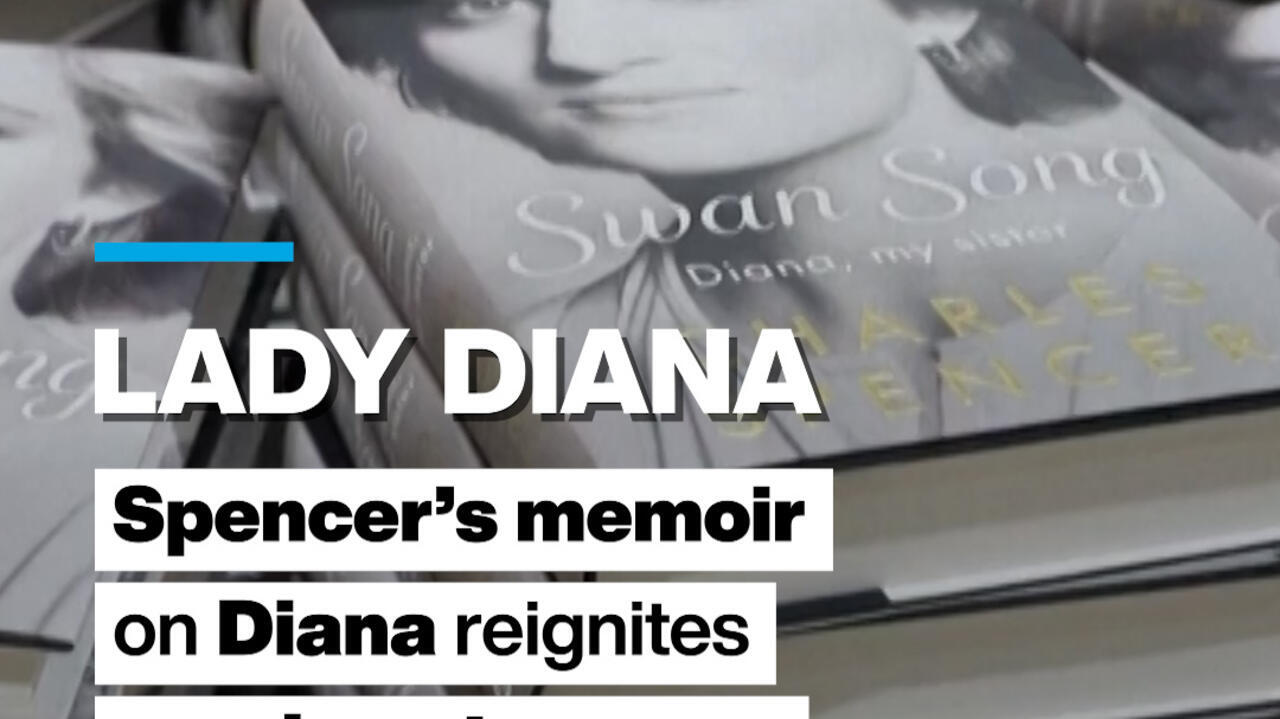 Close-up of a memoir about Diana Spencer with bold overlay text reading Lady Diana.