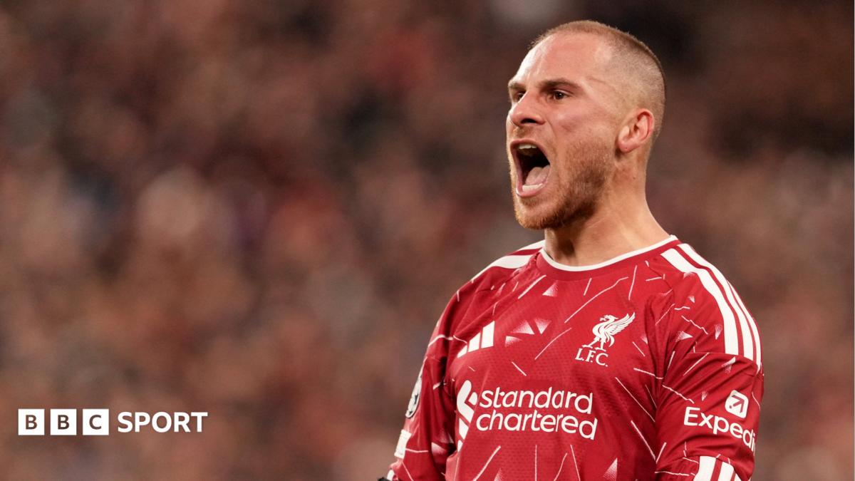 Liverpool footballer shouting in red jersey during a match