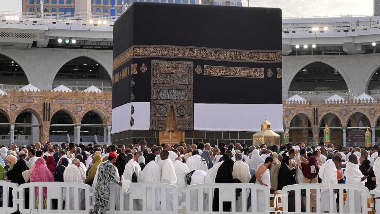 Pilgrims gather around the Kaaba, draped in black and gold, at Islam’s holiest site.