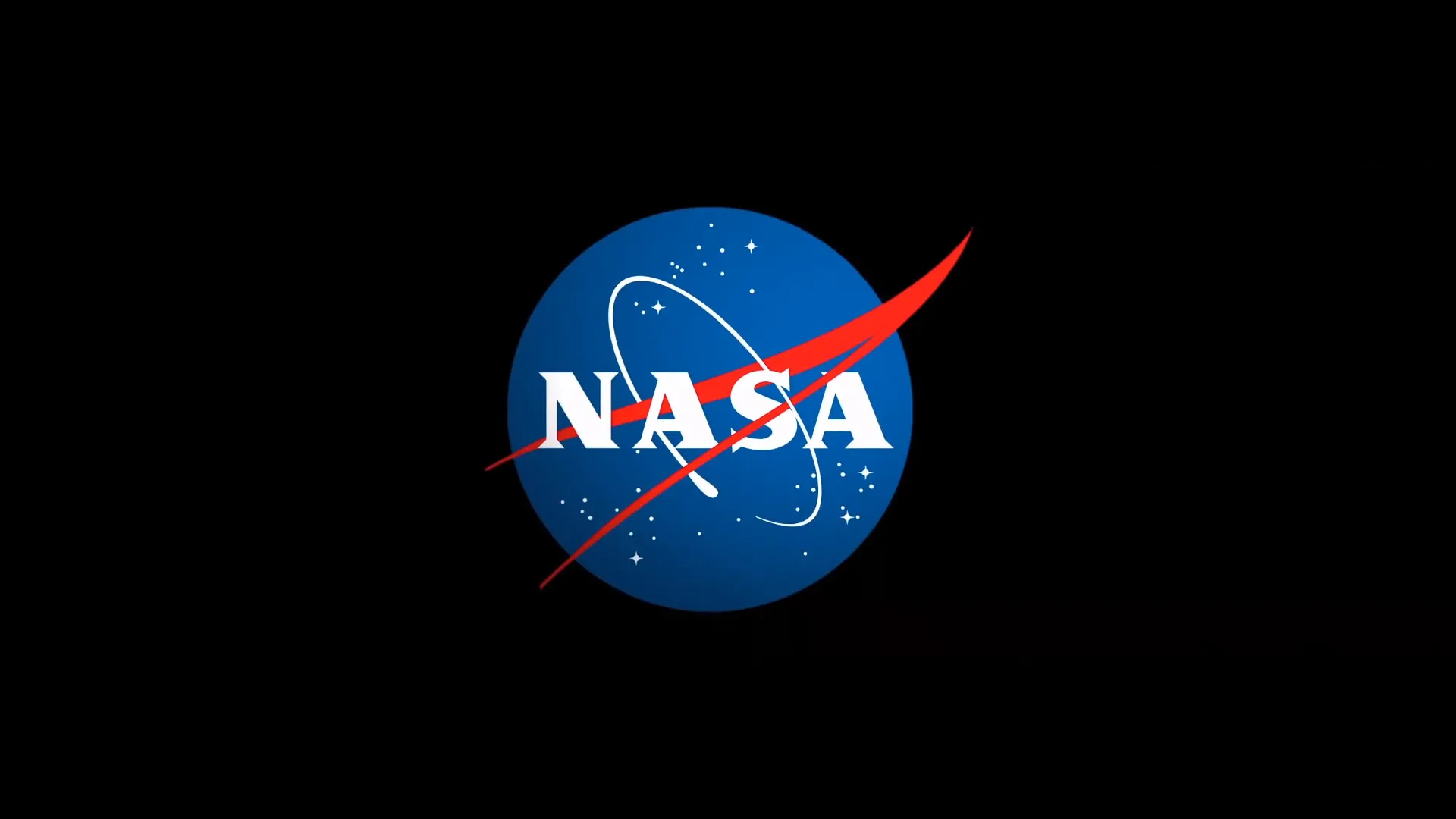 NASA logo with white lettering, red orbital swoosh, stars, and blue circular background