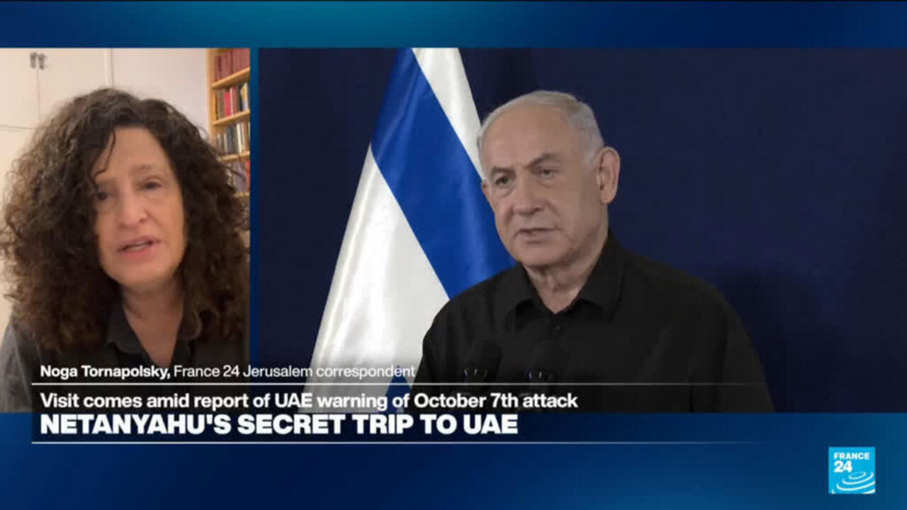 Split-screen broadcast shows a woman correspondent beside a man seated before an Israeli flag.