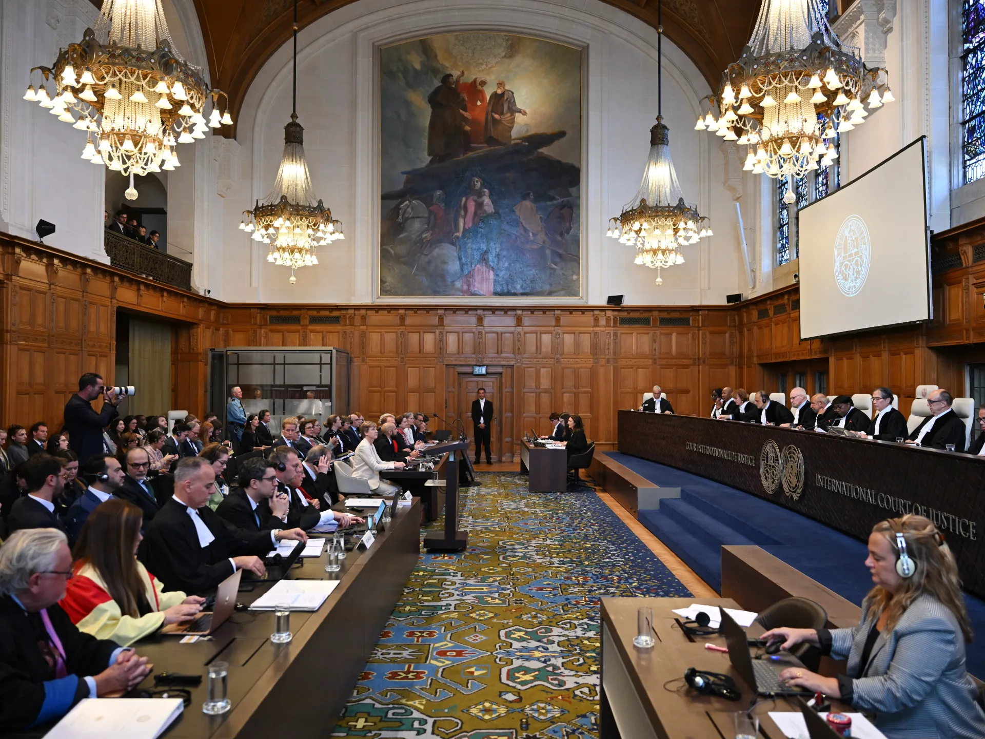 International Court of Justice courtroom with judges seated and legal teams attending a hearing