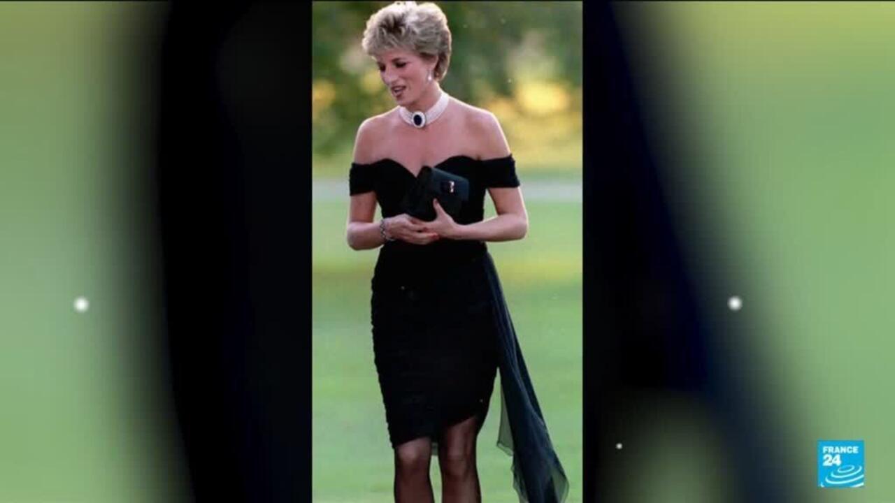 Princess Diana wearing a black off-the-shoulder dress and holding a clutch outdoors