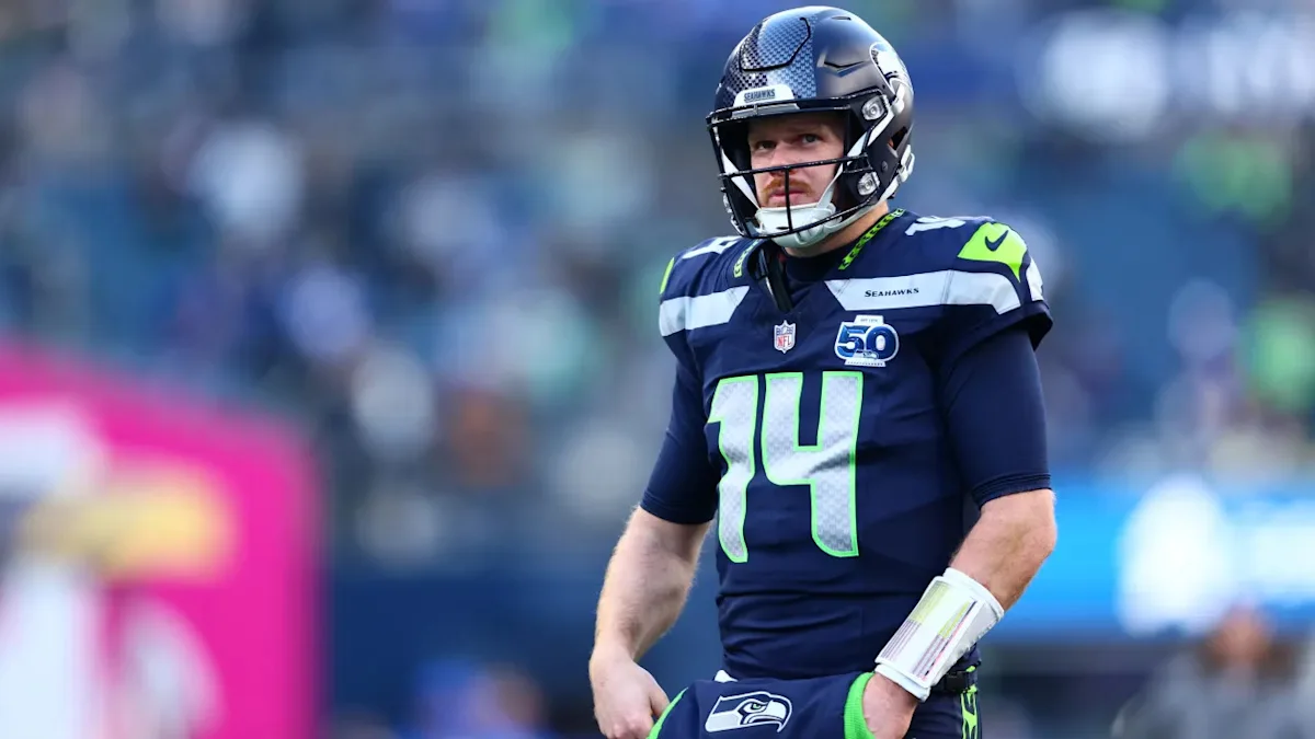 Seahawks quarterback wearing helmet and number 14 jersey during an NFL game