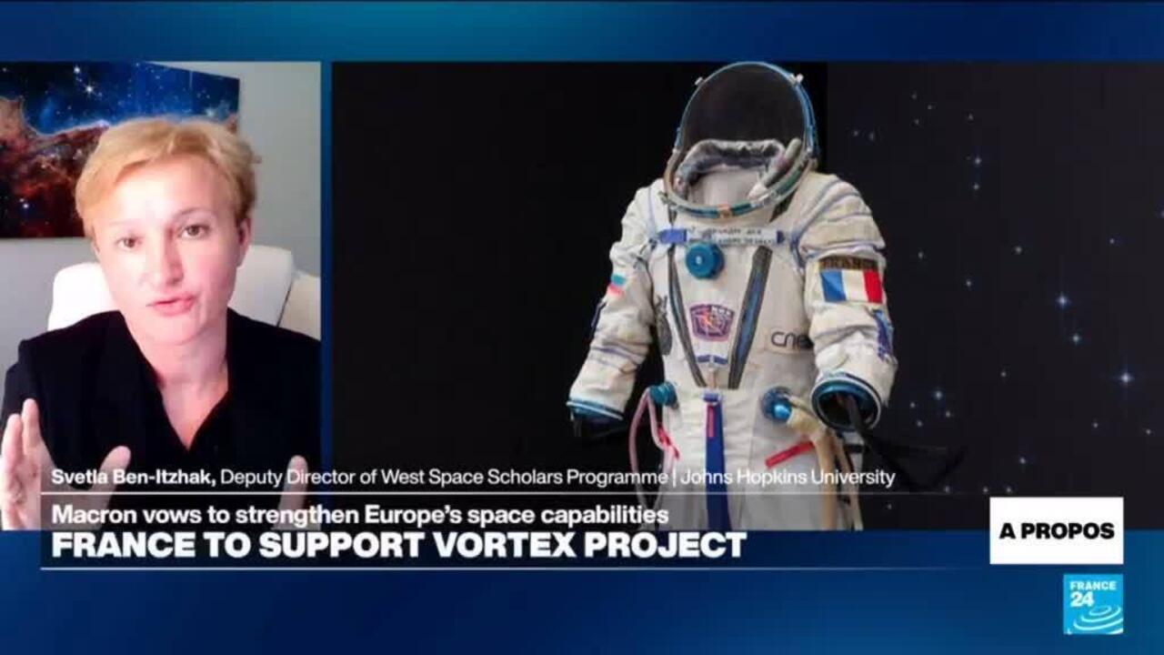 News broadcast showing a woman speaking beside an astronaut image and French space-policy graphics