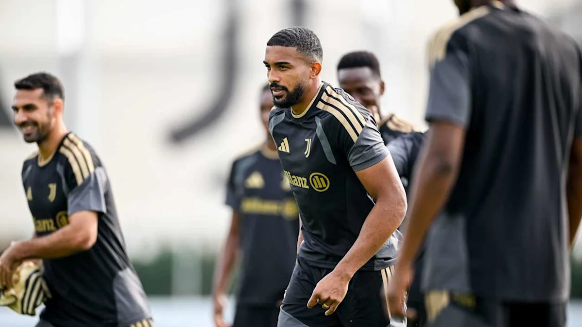 Footballers in black and gold Juventus training kits take part in a practice session