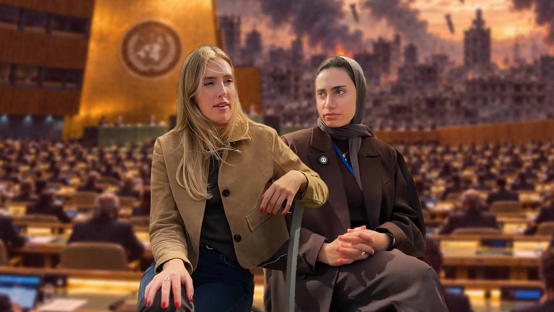 Two women sit in a large assembly chamber, with rows of seats and a city backdrop behind them.