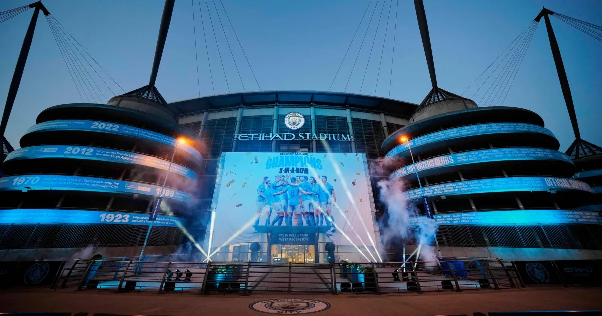 Illustration of a football stadium with a central display showing players and Premier League champions text.