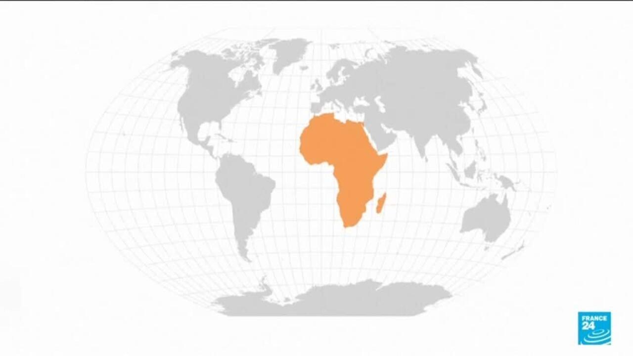Stylized globe map with Africa highlighted in orange against gray continents and latitude-longitude lines.
