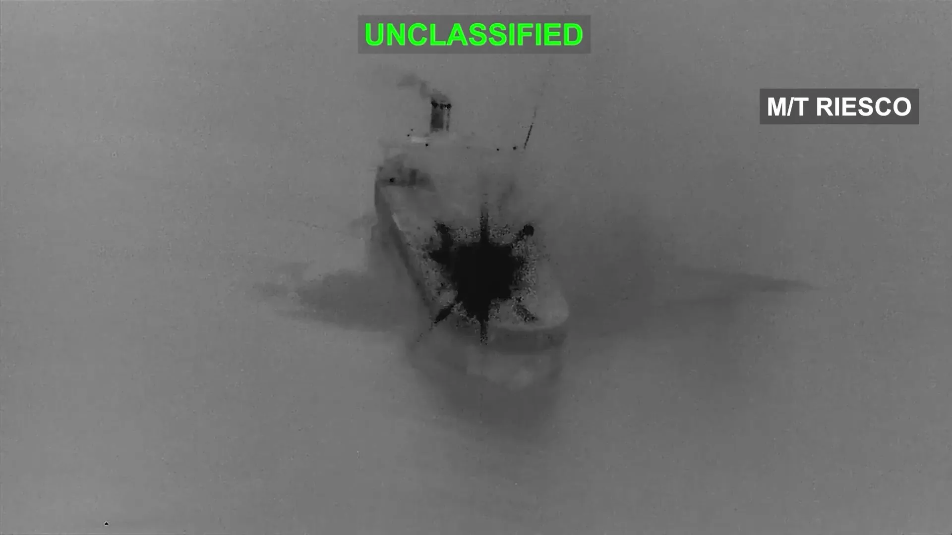 Infrared image shows a damaged vessel with a dark impact area and overlay labels.