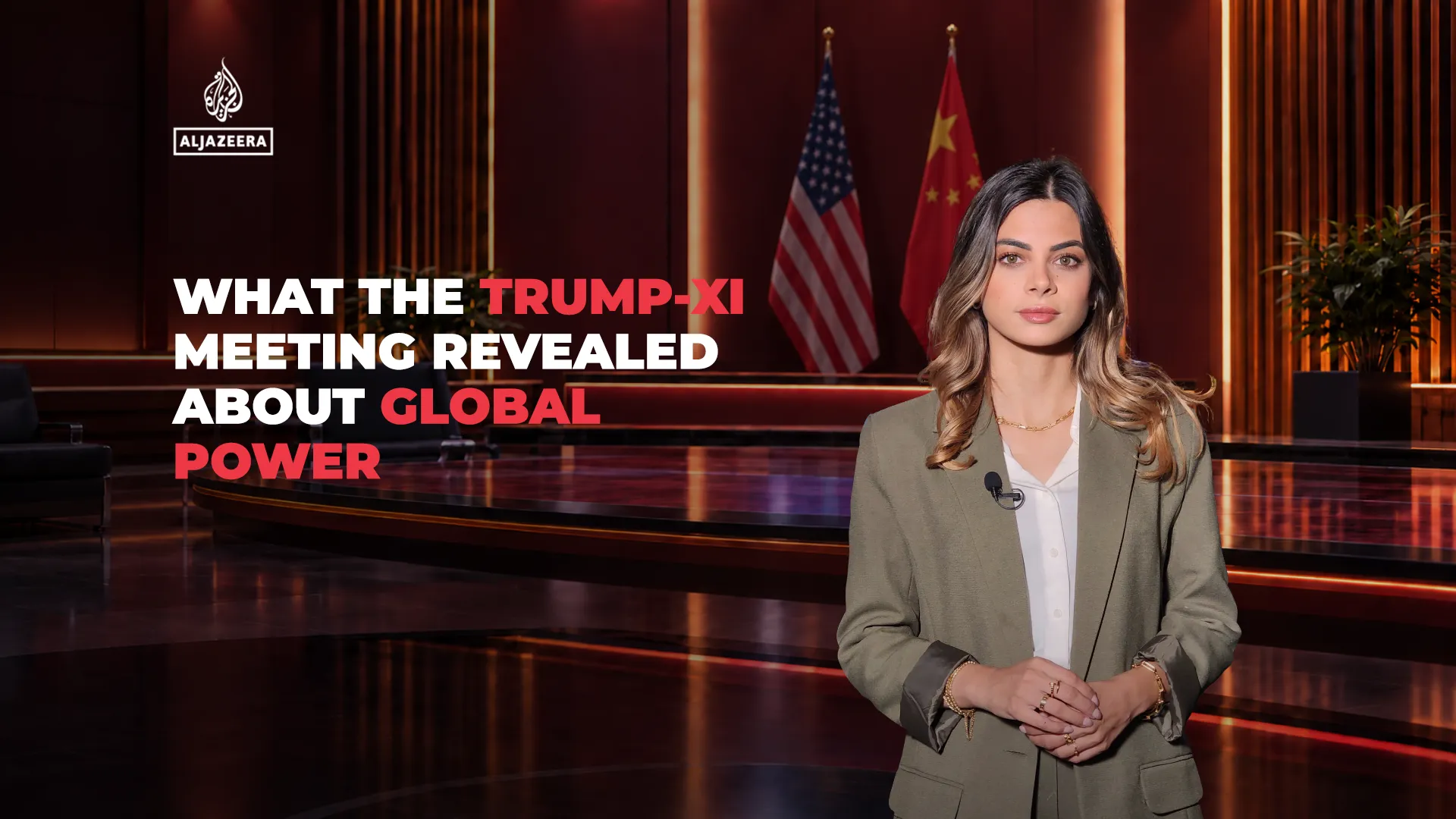 A woman stands before U.S. and Chinese flags beside a headline about their leaders’ meeting.