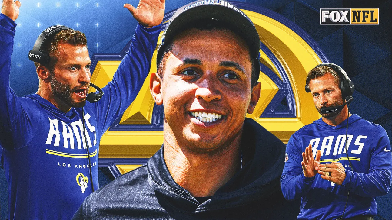 Three Los Angeles Rams coaches appear in blue apparel, with one man centered in front.