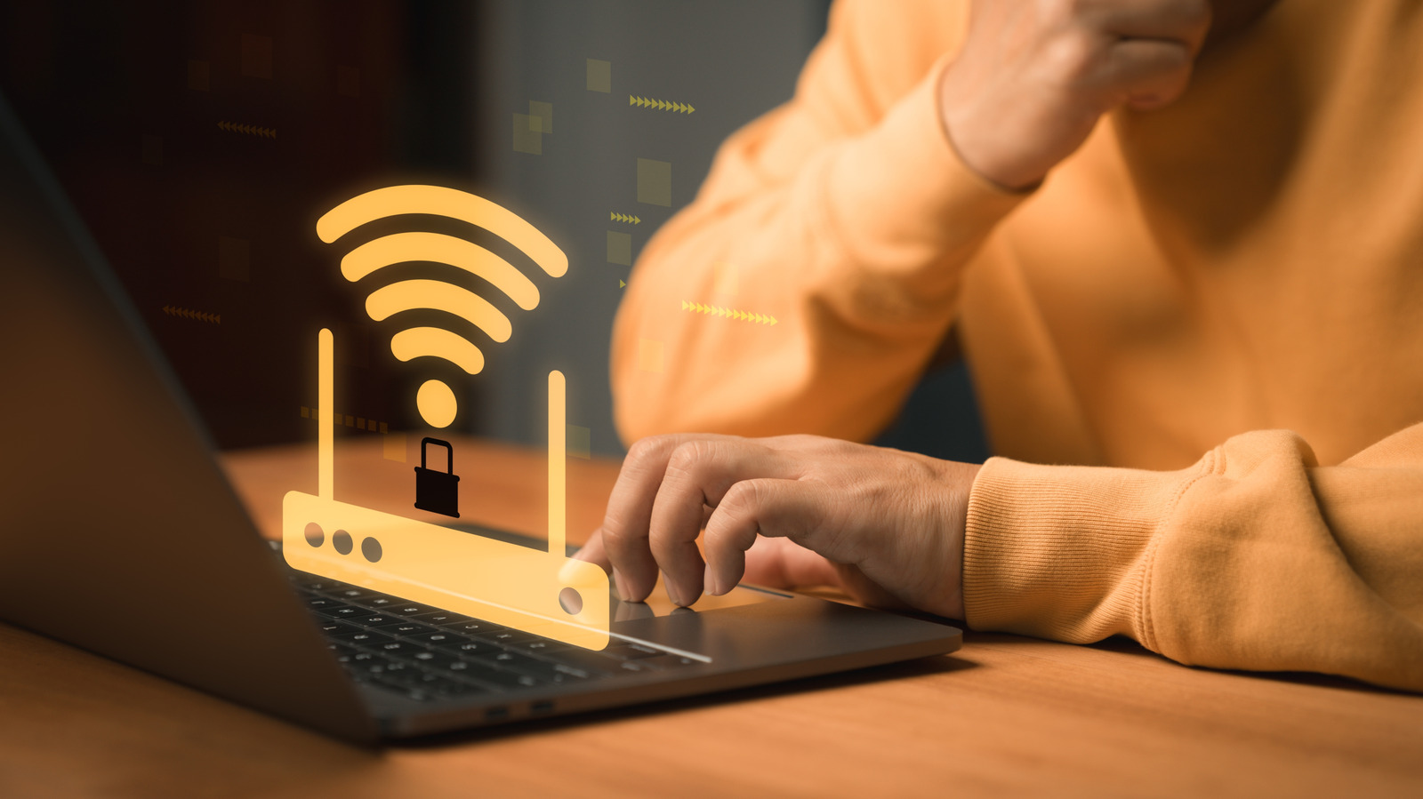 Person using a laptop with a glowing wireless router and security lock graphic