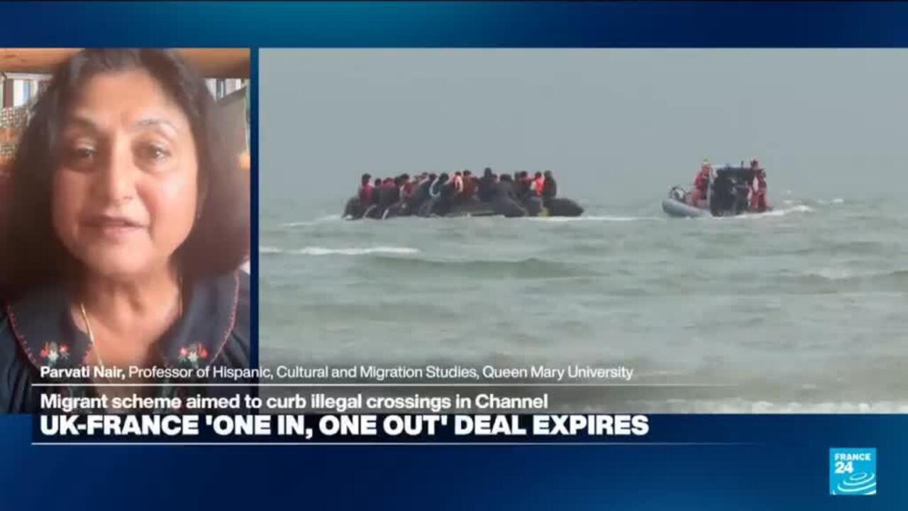 Split-screen news broadcast shows a woman speaking beside a crowded boat and rescue vessel on rough water.